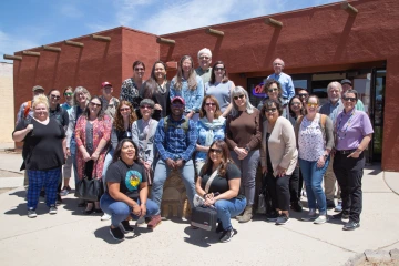 group of people standing in front of Hopi Cultural Center